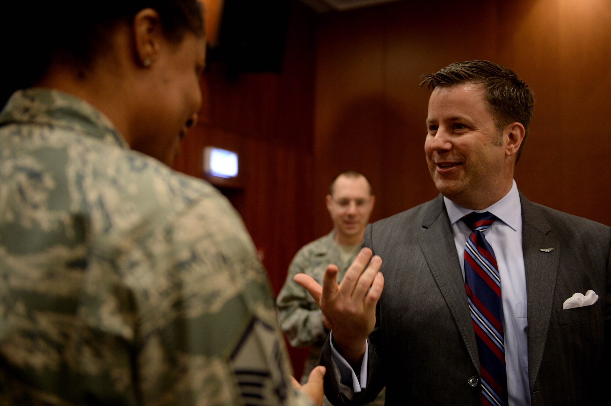 Robert Frank, CEO of the Air Force Sergeants Association and native of Duncanville, Texas, right, speaks with an AFSA member after the AFSA Chapter 1681 general meeting in the Landscheid Room at Club Eifel on Spangdahlem Air Base, Germany, Nov. 13, 2014. Frank visited Spangdahlem to meet the members of AFSA Chapter 1681 and to discuss future plans and objectives. (U.S. Air Force photo by Airman 1st Class Timothy Kim/Released)