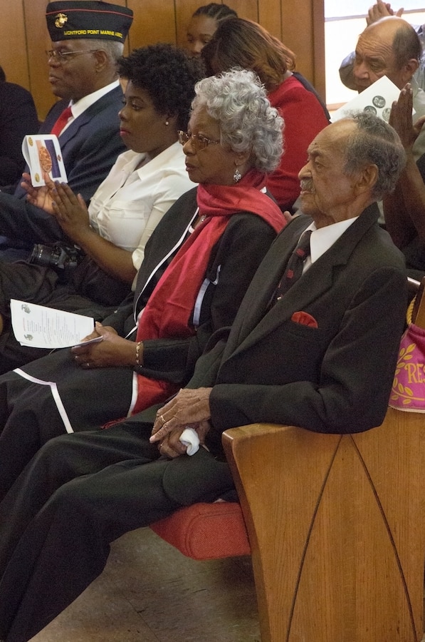 William J. Brashear (right), a Montford Point Marine, sits beside his wife, Adele G. Brashear, during a ceremony in which he is presented the Congressional Gold Medal at the Mount Era Baptist Church in Morgan City, La., Nov. 15, 2014. The Congressional Gold Medal is the nation’s highest honor given to civilians and is presented to all Montford Point Marines to recognize their contribution to the Marine Corps and the United States of America. 