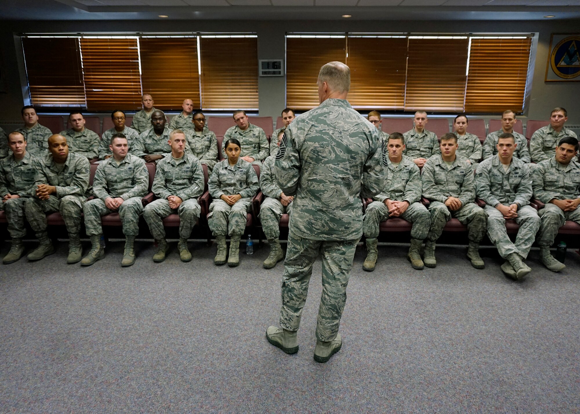 Chief Master Sgt. of the Air Force James Cody addresses Airmen Leadership School class 15-B Nov. 14, 2014, at F.E. Warren Air Force Base, Wyo. Cody stated to the class that the Air Force is unique as it invests time and money into the three important areas: training, education and experience; which help create Airmen who are prepared and extremely capable. (U.S. Air Force photo/Lan Kim)