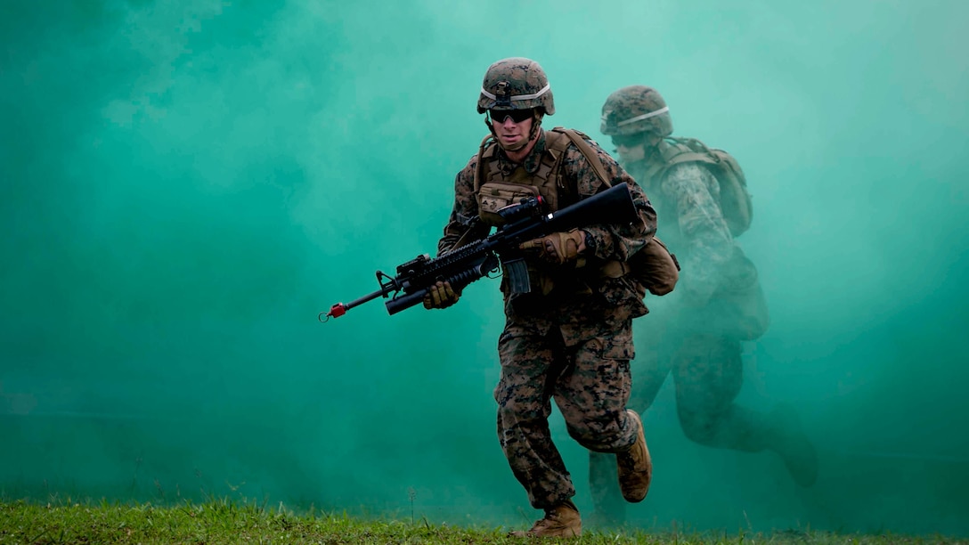 U.S. Marines, assigned to 2nd Battalion, 9th Marine Regiment, Echo Company, and Royal Brunei Land Forces conduct Military Operations in Urban Terrain training during Cooperation Afloat Readiness and Training (CARAT) Brunei 2014 at Camp Penanjong. In its 20th year, CARAT is an annual, bilateral exercise series with the U.S. Navy, U.S. Marine Corps and the armed forces of nine partner nations including, Bangladesh, Brunei, Cambodia, Indonesia, Malaysia, the Philippines, Singapore, Thailand and Timor-Leste. 