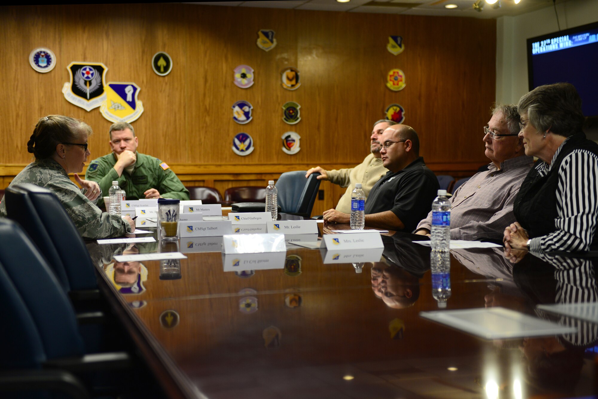 U.S. Air Force Col. Heather Buono, 27th Special Operations Mission Support Group commander, provides a mission brief during a tour to honorary commanders Nov. 13, 2014 at Cannon Air Force Base, N.M. The goal of the honorary command program is to have all honorary commanders visit each group on base in order to develop a deeper understanding of the mission over their year-long tenure. (U.S. Air Force photo/Airman 1st Class Shelby Kay-Fantozzi)