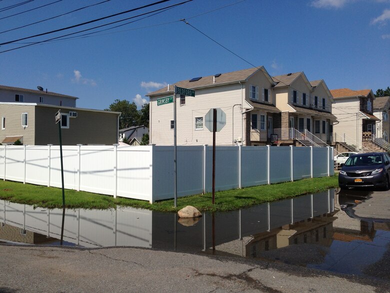 After a storm in 2013, large puddles formed at the corner of Grimsby and Bedford Streets in the Midland Beach neighborhood.