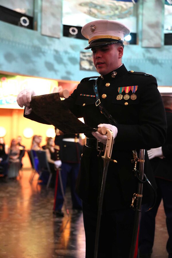 Capt. Fredric Smith, battalion adjutant with 3rd Battalion, 14th Marine Regiment, 4th Marine Division reads a message from the 13th Commandant of the Marine Corps, Maj. Gen. John A. Lejeune during 3rd Bn., 14th Marines’ Marine Corps birthday celebration at Adventure Aquarium in Camden, New Jersey, Nov. 15, 2014. The message is read every year at Marine Corps birthday celebrations to remind Marines of their traditions and heritage.  (U.S. Marine Corps Photo by Cpl. J. Gage Karwick/Released)