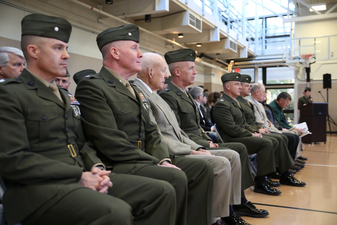 Retired Col. James “Rip” Harper (third from left) and Brig. Gen. Patrick Hermesmann, commanding general of 4th Marine Logistics Group (fourth from left), observe the 6th Engineer Support Battalion’s battle color rededication ceremony in Portland, Ore., Nov. 15, 2014.The battalion celebrated the 70th anniversary of its formation with a rededication ceremony and paid homage to Harper, the battalion’s first adjutant. Harper served as the unit’s first adjutant as a first lieutenant in 1944, when the unit was formed in Guadalcanal during World War II. (U.S. Marine Corps photo by Cpl. Tiffany Edwards)
