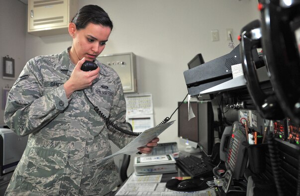 U.S. Air Force Airman 1st Class Luz Sanchez, 35th Fighter Wing command post emergency actions controller, conducts a giant-voice emergency notification test at Misawa Air Base, Japan, Nov. 18, 2014. During real-world and exercise emergency situations, Sanchez ensures emergency responders are notified and updated on current situations ensuring proper flow of accurate information. (U.S. Air Force photo/Senior Airman Jose L. Hernandez-Domitilo/Released)