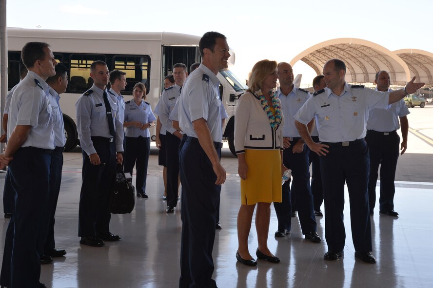 U.S. Air National Guard Col. Duke Pirak, 154th Operations Group commander, speaks with Secretary of the Air Force Deborah Lee James about the F-22 Raptor during her visit to the 19th and 199th Fighter Squadrons at Joint Base Pearl Harbor-Hickam, Hawaii, Nov. 17, 2014. During her time with the 15th Wing, James received a windshield tour of the Hickam flightline and visited with Airmen at the Binnicker Professional Military Education Center. James is on an 11-day visit of Pacific-region bases with stops in Guam, Japan, Korea and Alaska. (U.S. Air Force photo by Staff Sgt. Alexander Martinez/Released)   