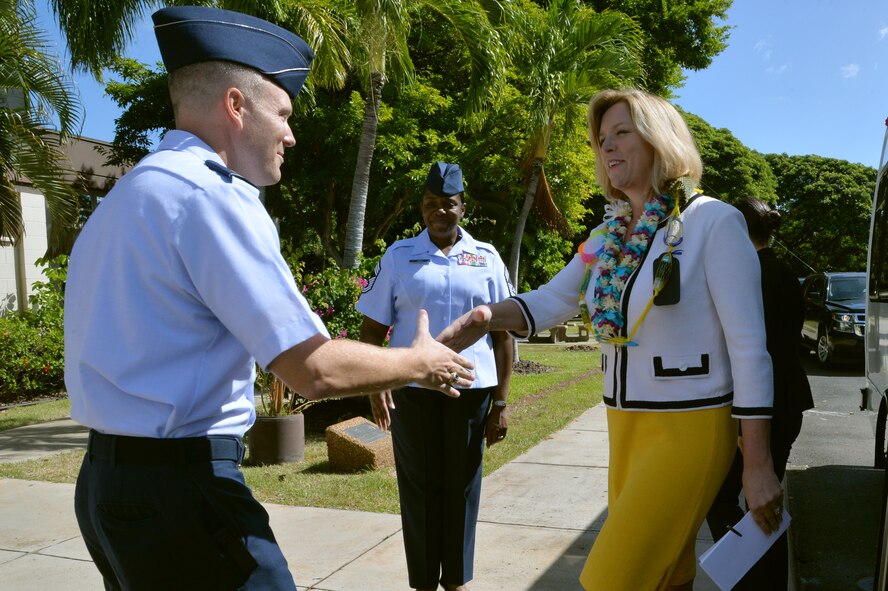 U.S. Air Force Lt. Col. Chris Hauver, 647th Force Support Squadron commander, greets Secretary of the Air Force Deborah Lee James as she arrives at the Hale Aina Dining Facility at Joint Base Pearl Harbor-Hickam, Hawaii, Nov. 17, 2014. During her time with the 15th Wing, James received a windshield tour of the Hickam flightline, met with leaders of the F-22 Raptor mission here and visited with Airmen at the Binnicker Professional Military Education Center. James is on an 11-day visit of Pacific-region bases with stops in Guam, Japan, Korea and Alaska. (U.S. Air Force photo by Staff Sgt. Alexander Martinez/Released)  