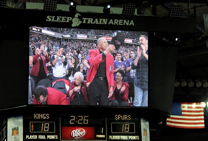 Members of a local Tuskegee Airmen Inc. chapter are honored during the Sacramento Kings Military Appreciation Night at the Sleep Train Arena in Sacramento, Calif., Nov. 15, 2014. The Kings held the military-themed game in honor of Veterans Day. (U.S. Air Force photo by Staff Sgt. Robert M. Trujillo/Released)