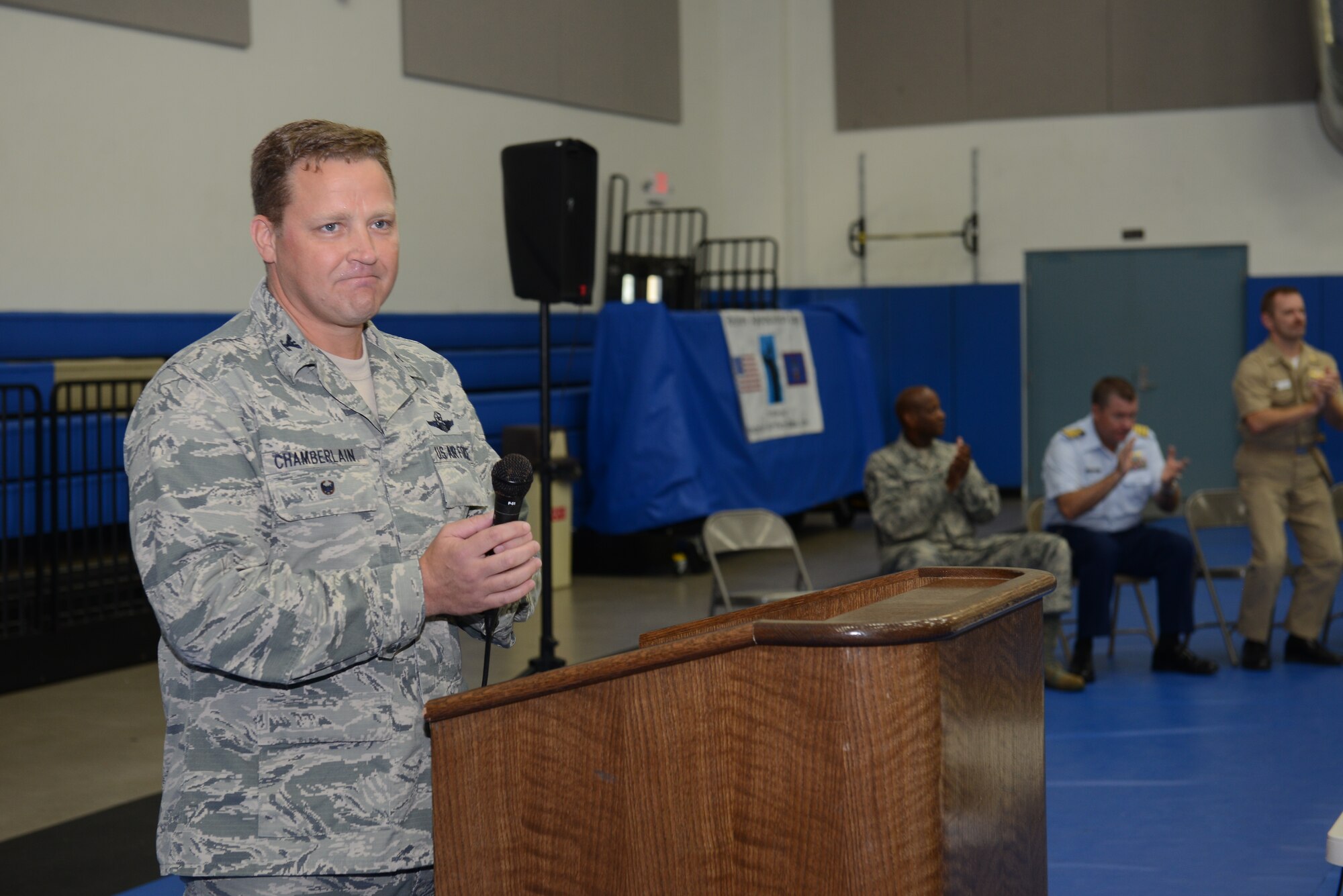 Col. Tyrell Chamberlain, 36th Wing Vice commander, speaks at the Coral Reef Fitness Center Nov. 15 2014 on Andersen Air Force Base Guam. Chamberlain thanked all the retirees and family members for their prior service. (U.S. Air Force Photo by Senior Airman Adarius Petty.)
