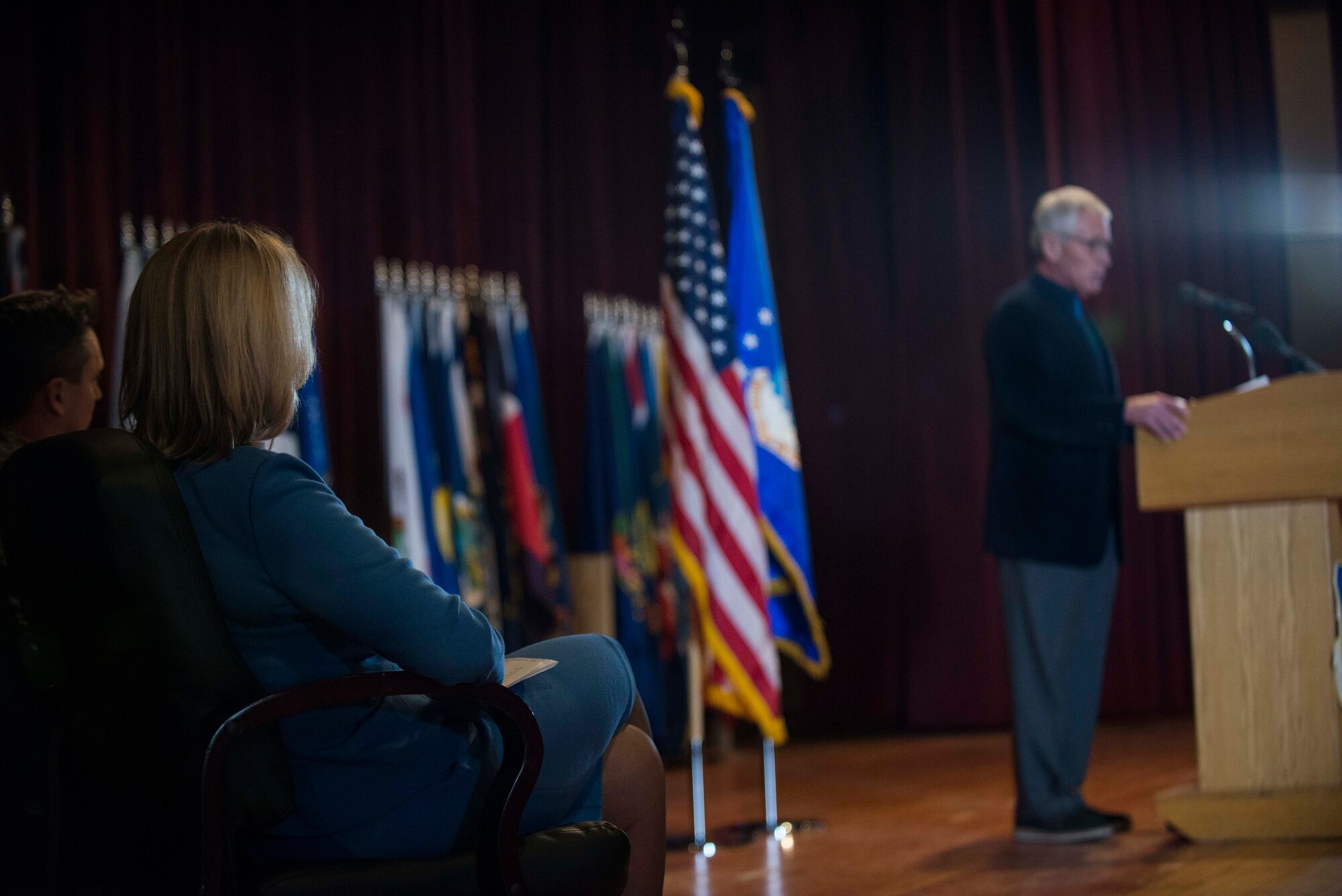 Secretary of the Air Force, Deborah Lee James, sits side-stage with 5th Bomb Wing commander Col. Jason Armagost, as Secretary of Defense Chuck Hagel addresses Airmen during an all-call at Minot Air Force Base, N.D., Nov. 14, 2014. Hagel spoke to Airmen about the results of a nuclear review ordered earlier this year. (U.S. Air Force photo/Airman 1st Class Lauren Pitts)  