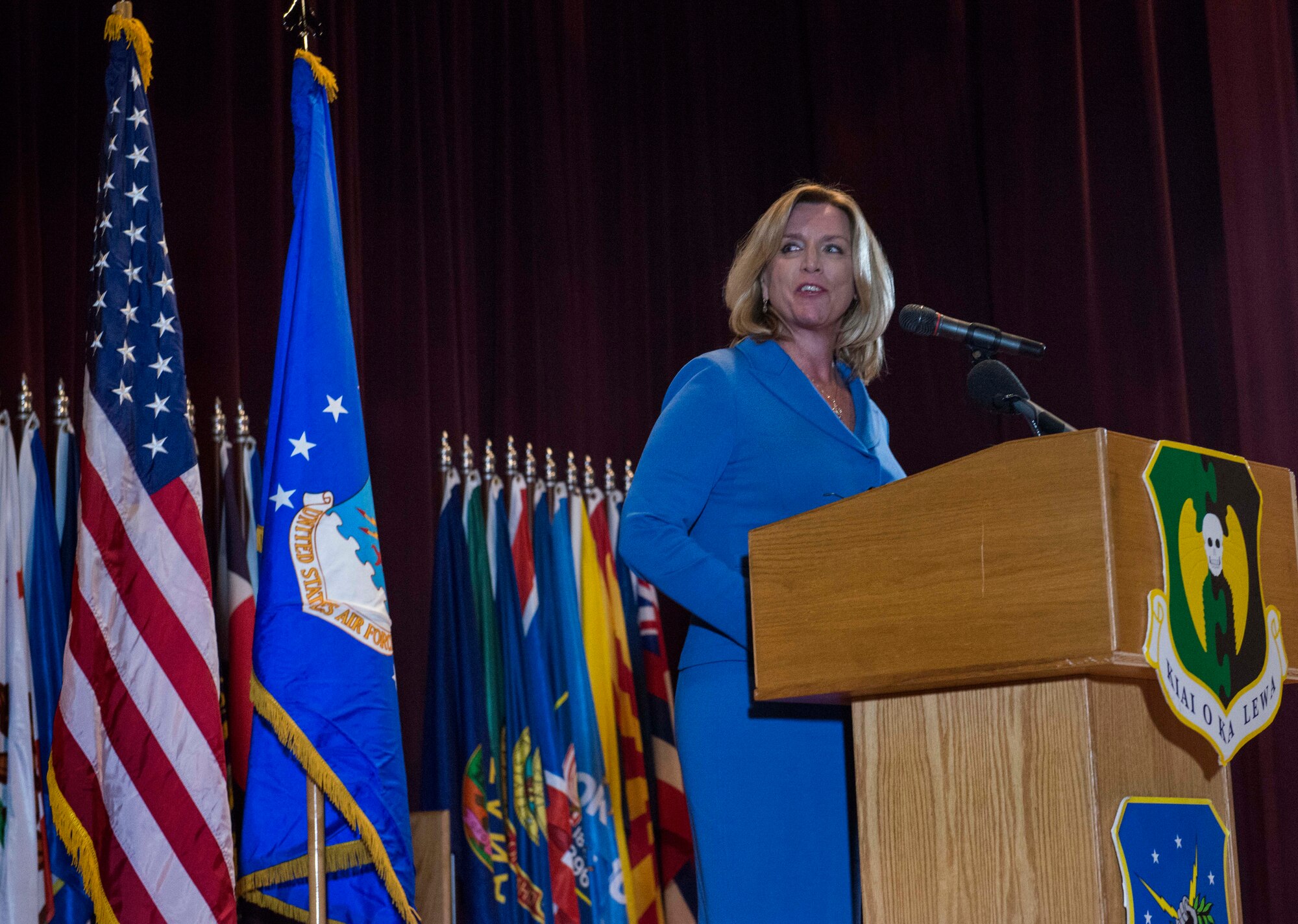 Secretary of the Air Force Deborah Lee James speaks to Airmen at the base theater before introducing Secretary of Defense, Chuck Hagel, at Minot Air Force Base, Nov. 14, 2014. James accompanied Hagel during his visit to Minot to discuss results from a nuclear review ordered earlier this year. (U.S. Air Force photo/Airman 1st Class Lauren Pitts)  