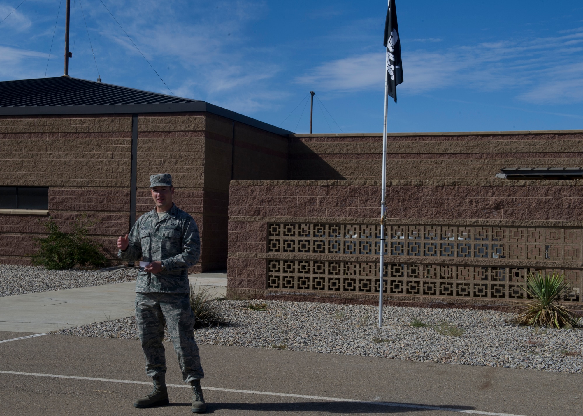 Major Christian Pierce, 4th Space Operating Location Alpha commander gives final remarks before he hands over the 4th Space facility to the 49th Wing at Holloman Air Force Base, N.M., Nov. 14. For over 30 years, 4th Space and its members have been stationed at Holloman, but as of Nov. 14 the squadron will relocate to Peterson Air Force Base, Colo. (U.S. Air Force photo by Senior Airman Leah Ferrante/released)