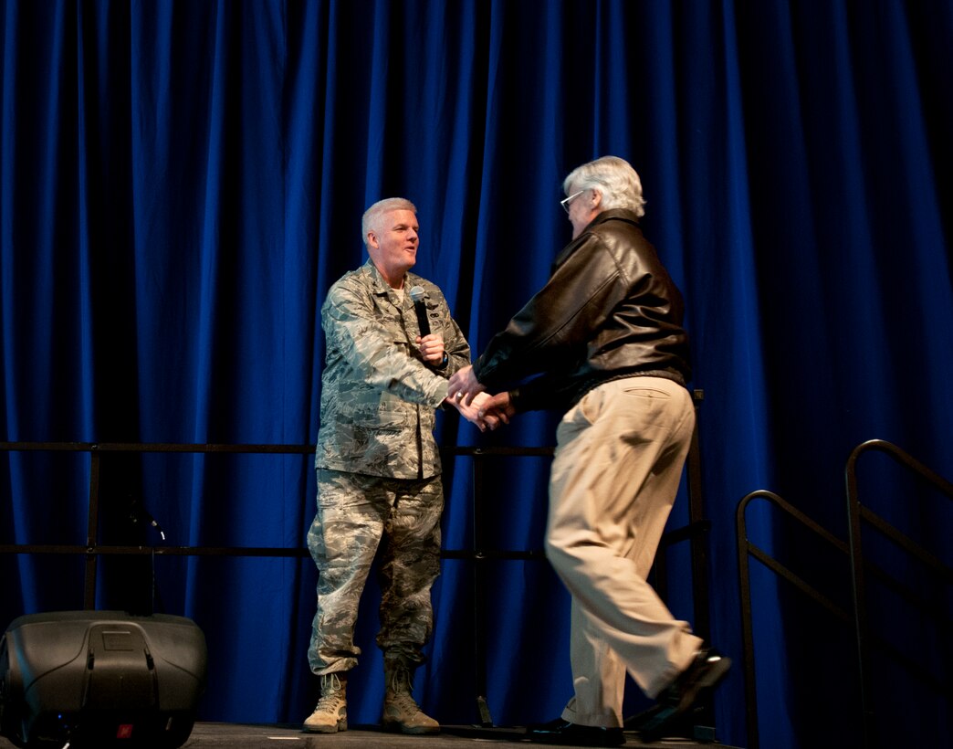 U.S. Air Force Col. James Johnson, Commander of the 133rd Airlift Wing, introduces Mr. Dave Roever, a Navy Vietnam Veteran, during resiliency training in St. Paul, Minn., Dec. 15, 2014. Roever triumphed over both physical and mental obstacles in his life and is sharing his experience with Airmen from the 133rd Airlift Wing.  (U.S. Air National Guard photo by Staff Sgt. Austen Adriaens/Released)