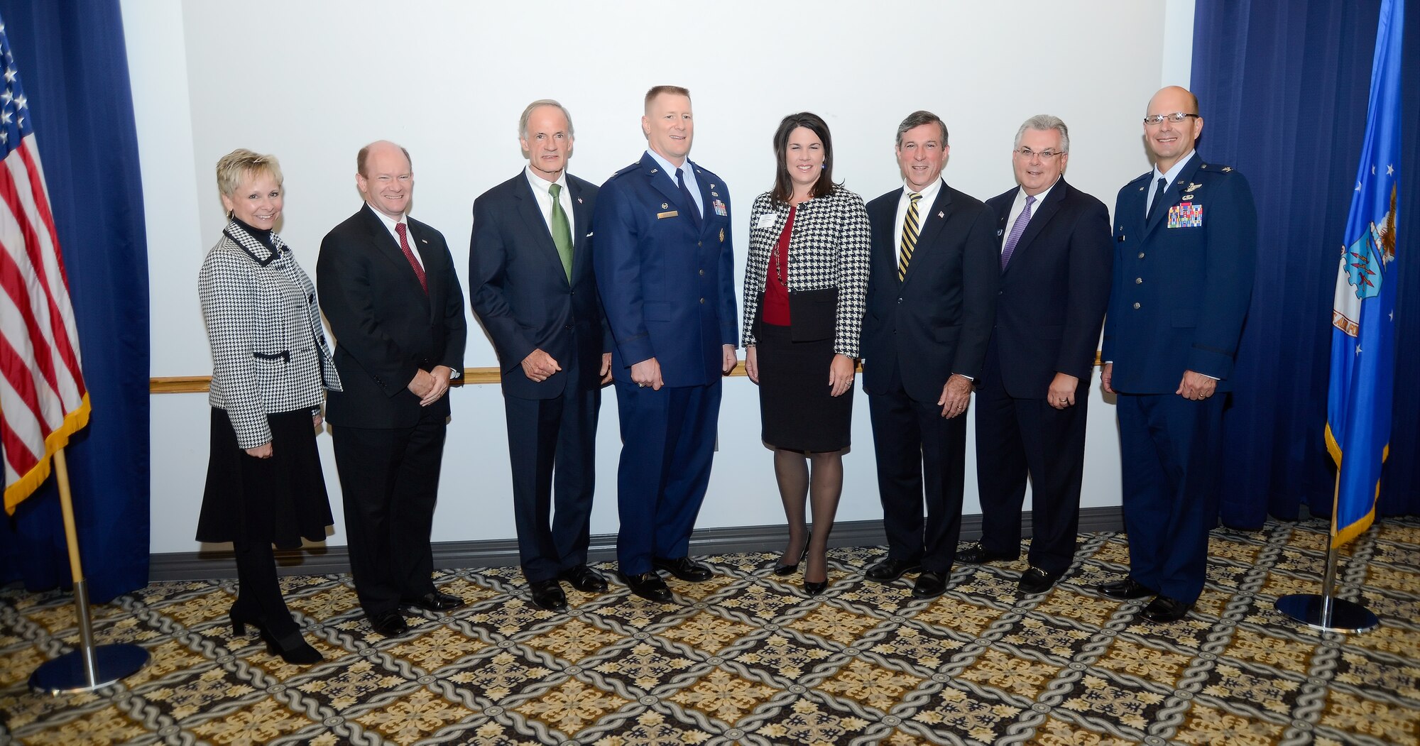 Dover Air Force Base leadership, U.S. representatives for Delaware and members of the Central Delaware Chamber of Commerce pose for a group photo following the formal portion of the 2014 Military Construction (MILCON) Breakfast on Nov. 10, 2014, at Dover Air Force Base, Del. The Dover MILCON breakfast is a forum hosted by the Central Delaware Chamber of Commerce to provide information on Dover AFB???s infrastructure, construction projects underway and those planned for the future. (U.S. Air Force photo/Greg L. Davis)