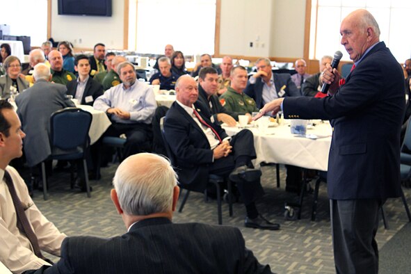 Major Gen. (ret.) John L. Borling addresses the Selfridge Base Community Council at Selfridge Air National Guard Base, Mich., Nov. 18, 2014. Borling spoke about he used poems that he composed in his mind to help him survive his experience as a prisoner of war during the Vietnam War. (U.S. Air National Guard photo by Tech. Sgt. Dan Heaton)