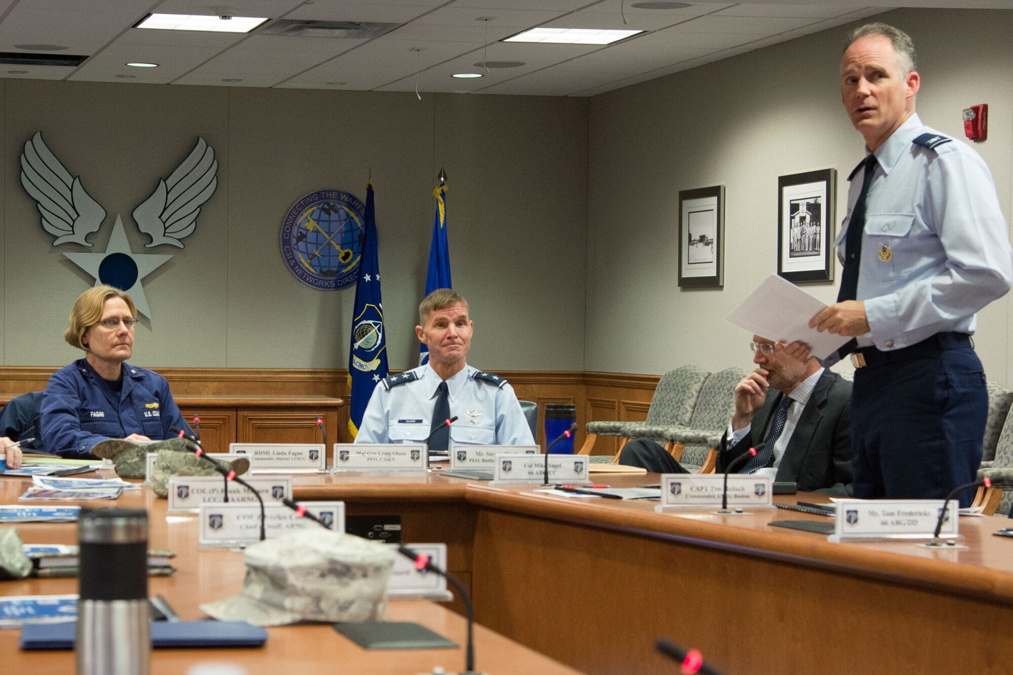 Col. Michael A. Vogel, 66th Air Base Group commander, briefs Rear Adm. Linda L. Fagan, Commander of the First U.S. Coast Guard District, Nov. 17 in Building 1606. Fagan also toured and witnessed demonstrations at the Hanscom Collaboration and Innovation Center (formerly known as the C4ISR Enterprise Integration Facility, or CEIF). The Coast Guard is one of many joint-service and other partners Hanscom hopes to partner with in using the facility's capabilities. (U.S. Air Force Photo by Mark Herlihy)