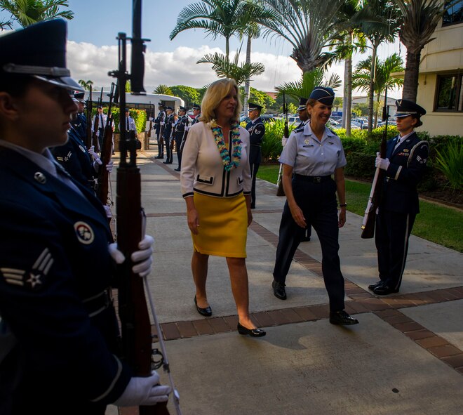 Secretary of the Air Force Deborah Lee James walks through an "Honors Cordon" with Gen. Lori Robinson upon her arrival at the PACAF headquarters building Nov. 17, 2014, at Joint Base Pearl Harbor-Hickam, Hawaii. While PACAF headquarters was James' first stop, she will continue to tour the PACAF theater to see first-hand the importance of the Asia-Pacific region, the rebalance to the region, and to speak with PACAF Airmen. (U.S. Air Force photo/Staff Sgt. Nathan Allen)