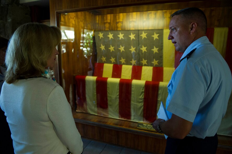 Secretary of the Air Force Deborah Lee James receives a historical tour from Maj. Gen. Jon Norman, Pacific Air Forces chief of staff, upon her arrival at the PACAF headquarters building Nov. 17, 2014, at Joint Base Pearl Harbor-Hickam, Hawaii. While PACAF headquarters was James' first stop, she will continue to tour the PACAF theater to see first-hand the importance of the Asia-Pacific region, the rebalance to the region, and to speak with PACAF Airmen. (U.S. Air Force photo/Staff Sgt. Nathan Allen)