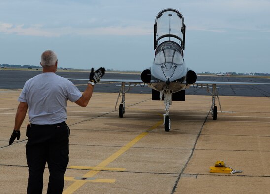 Chris Kezar, 27th Fighter Squadron T-38 Talon maintainer, taxis in a T-38 after a training mission at Langley Air Force Base, Va., Nov. 17, 2014. Talons are cost-effective training partners due to their lower-than-average fuel consumption and minimal maintenance costs. (U.S. Air Force photo by Senior Airman Austin Harvill/Released)