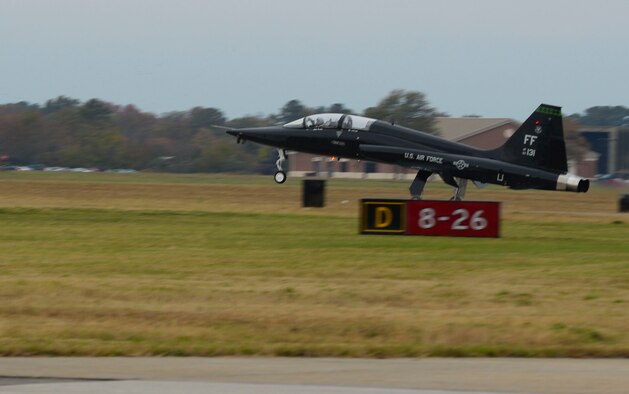 A T-38 Talon lands after a training mission at Langley Air Force Base, Va., Nov. 17, 2014. Talons team up with F-22 Raptors to act as enemy fighters during training missions. (U.S. Air Force photo by Senior Airman Austin Harvill/Released)