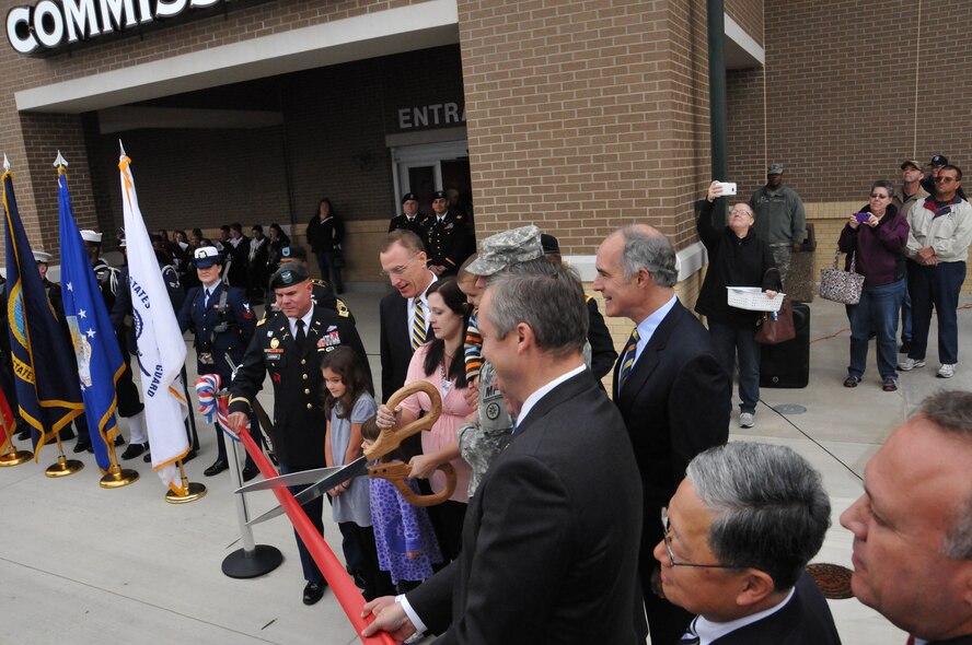 The grand opening of the Pittsburgh Area Commissary and The Moon Township Express and Military Clothing Store took place at the McGarity Army Reserve Center in Coraopolis Pa. Oct. 21, 2014. The ribbon cutting ceremony and the chance to browse the new stores attracted about 400 people. The new facility has been built to replace the Charles E. Kelly  Support Facility that was built in 1959 and located in Oakdale Pa.  The new Commissary and Express store will serve 36,386 military members in the local area, and about 168,000 retired service members and families within 100-mile radius and provides goods and services at discounted prices. In attendance was U.S. Sen. Bob Casey, D-Pa., U.S. Rep. Tim Murphy, R-Upper St. Clair, and U.S. Rep. Mike Doyle, D-Forest Hills. (U.S. Air National Guard Photo by Master Sgt. Shawn Monk/Released)  