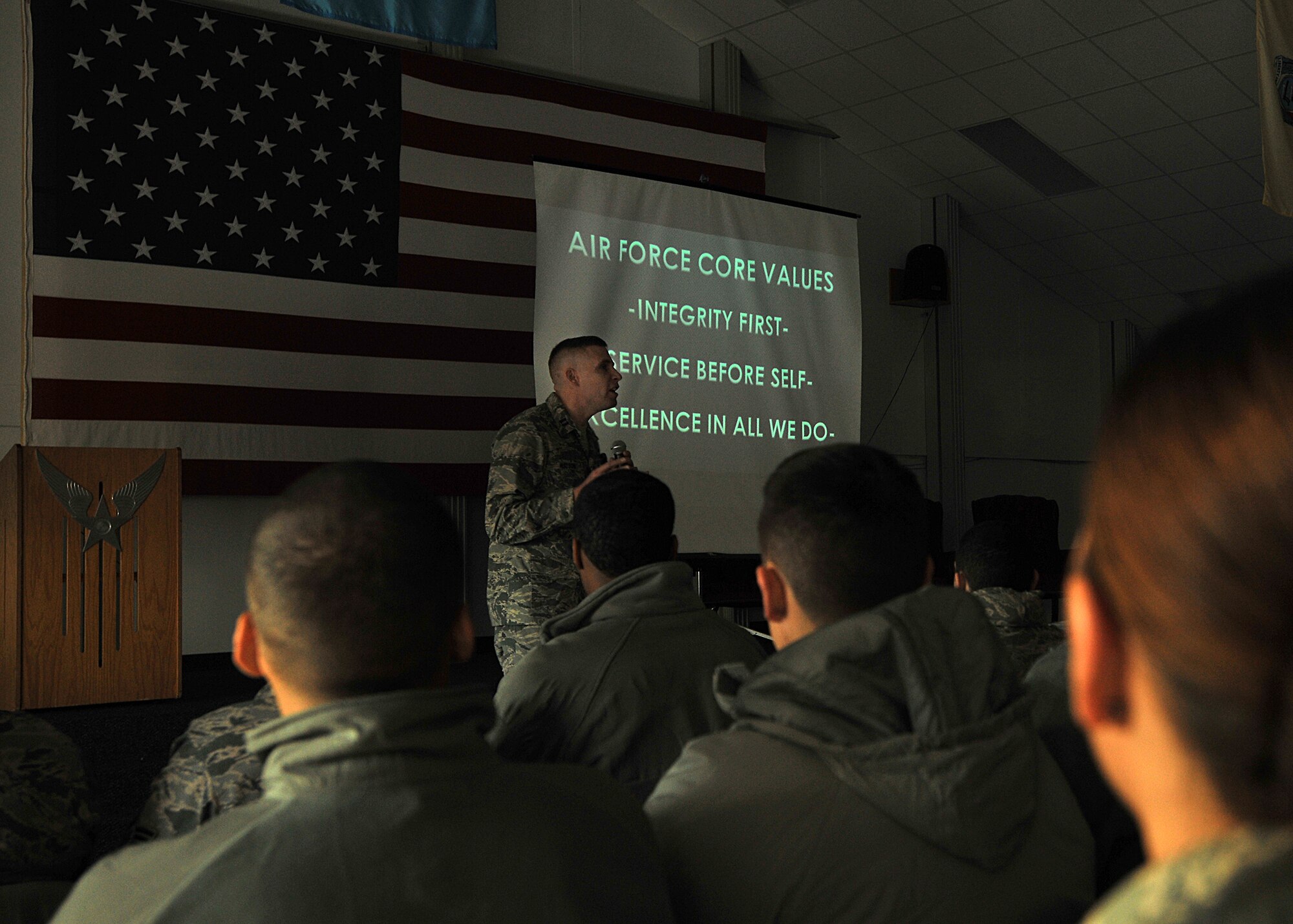Chap. (Capt.) Christopher Watson, 319th Air Base Wing chaplain, talks to Airmen about the Core Values during a Wingman Day seminar Nov. 13, 2014, on Grand Forks Air Force Base, N.D. Watson discussed how Airmen should implement the Air Force Core Values in their daily lives such as the U.S. military Special Forces do every day. (U.S. Air Force photo/Senior Airman Xavier Navarro)