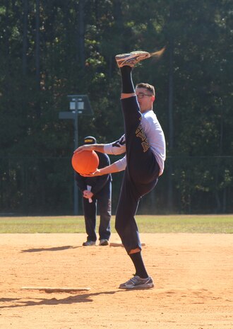 A Naval Nuclear Power Training Command student displays his pitching wind up during the 4th Annual Sexual Assault Prevention and Response Kickball Tournament Nov. 15, 2014, at Locklear Park on Joint Base Charleston, S.C. More than 20 teams participated in the event designed to raise awareness and promote efforts to prevent sexual assault. (U.S. Navy photo/Petty Officer 2nd Class Jason Pastrick)
