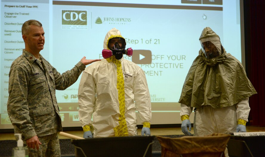 Maj. Carl Champion, 2nd Aerospace Medical Squadron Bioenvironmental Flight commander, explains the functions of personal protective equipment at Centenary College of Louisiana in Shreveport, La., Nov. 14, 2014. The training derived from materials developed by the U.S. Centers for Disease Control and focused on effectively employing the protective gear that would be worn by responders. (U.S. Air Force photo/Airman 1st Class Curt Beach)