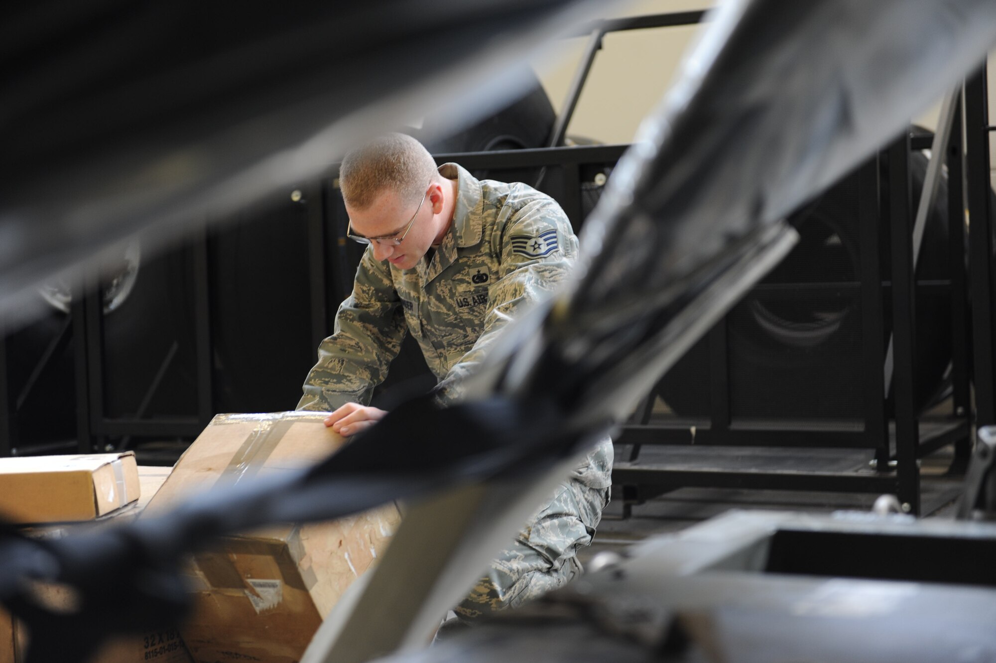 Staff Sgt. Kyle Sarringer, 86th LRS supply journeyman, verifies the stock numbers of various equipment for a contingency tasking on Ramstein Air Base, Germany, Sep. 24, 2014. The 86th LRS is a 24-hour operation providing fuel, deployment necessities and equipment for all inbound and outbound aircraft and military members. (U.S. Air Force photo/Airman 1st Class Michael Stuart) 