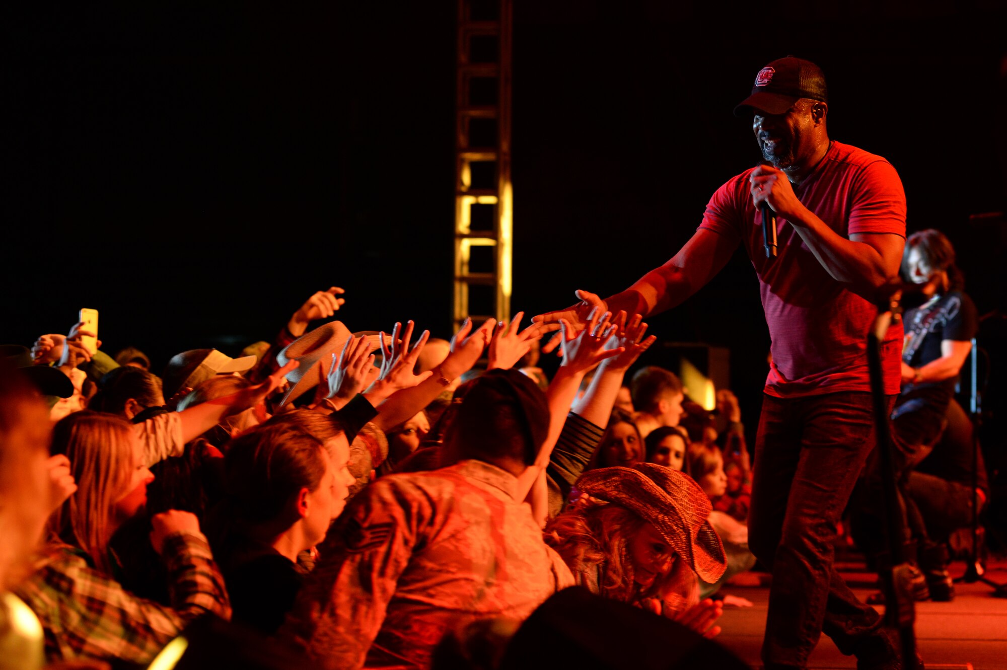 Country music star Darius Rucker performs during a concert Nov. 14, 2014, at Hangar One at Spangdahlem Air Base, Germany. More than 500 Sabers attended the concert. (U.S. Air Force photo by Airman 1st Class Dylan Nuckolls/Released)