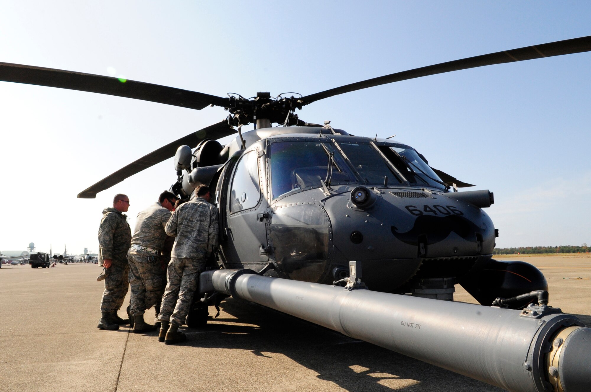 Members of Kadena's 33rd Rescue Squadron prepare one of their HH-60Gs for take-off during exercise Keen Sword on Komatsu Air Base, Japan, Nov. 12, 2014. Exercise Keen Sword is a regularly scheduled a joint-bilateral training exercise between the U.S. military and Japan Self-Defense Force. (U.S. Air Force photo by 2nd Lt. Erik Anthony/Released)