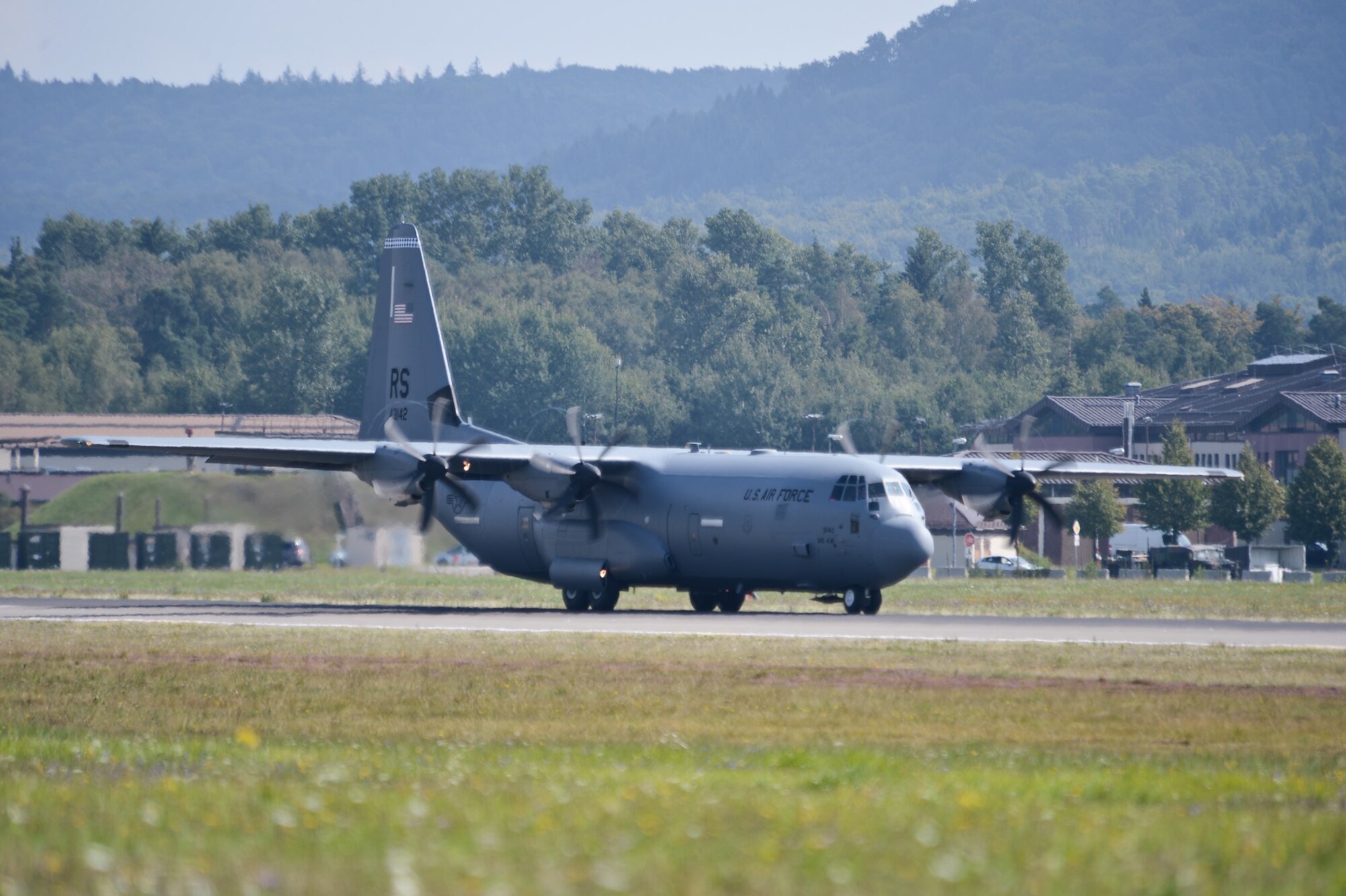 A C-130J Super Hercules takes off on the run-way at Ramstein Air Base, Germany, Sept. 5, 2014. The Super Hercules is the newest aircraft in the Air Force, primarily used for cargo and troop movements. (U.S. Air Force photo/Airman 1st Class Michael Stuart) 