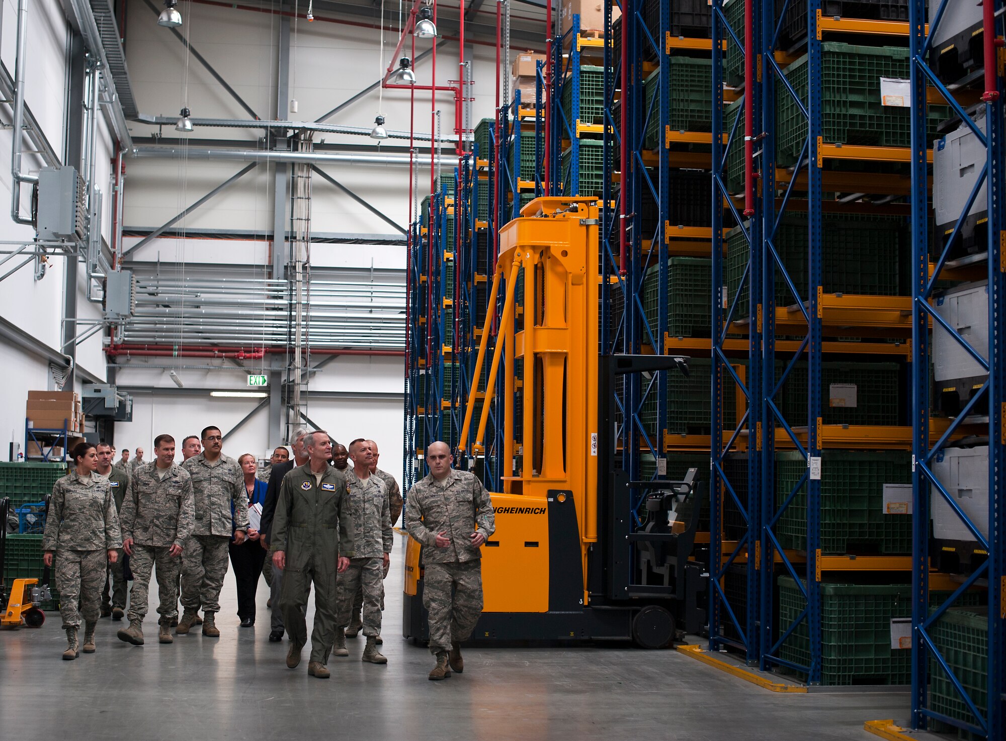 Lieutenant Gen. Darryl Roberson, 3rd Air Force commander, receives a tour of the individual protective equipment warehouse during an immersion with the 86th Airlift Wing on Ramstein Air Base, Germany Aug. 28, 2014. Roberson recently took command of the 3rd Air Force and visits such as these allow him to see firsthand Ramstein’s impact on the Air Force mission. He also spoke with Airmen from throughout the 86th AW and learned how their day-to-day jobs impact the mission. (U.S. Air Force photo/Senior Airman Damon Kasberg)