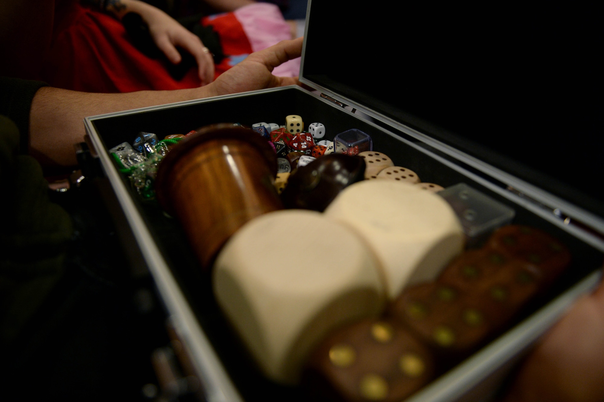 Dice rest in a case during Operation Sci-Fi Con 2015 in the Landscheid Room at Club Eifel on Spangdahlem Air Base, Germany, Nov. 15, 2014. Spangdahlem community members enjoyed various trading card and tabletop games that involved dice and figurines. (U.S. Air Force photo by Airman 1st Class Timothy Kim/Released)