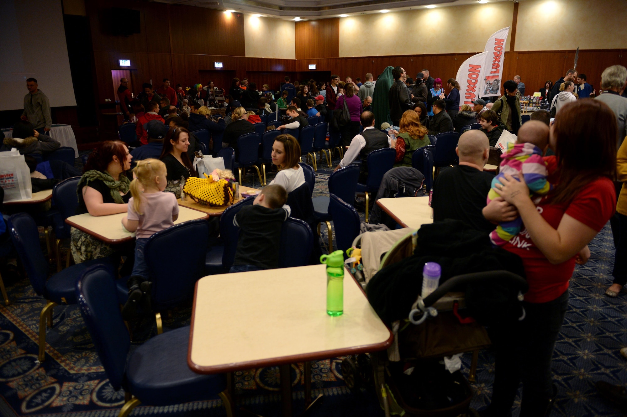 Spangdahlem community members attend Operation Sci-Fi Con 2015 in the Landscheid Room at Club Eifel on Spangdahlem Air Base, Germany, Nov. 15, 2014. Members of various science-fiction and fantasy costume clubs around Europe attended the convention and interacted with the Spangdahlem community. (U.S. Air Force photo by Airman 1st Class Timothy Kim/Released)