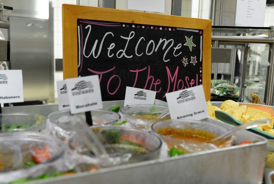 A welcome sign sits next to an assortment of salsas for the “Messlords” luncheon at the Mosel Dining Facility on Spangdahlem Air Base, Germany, Nov. 15, 2014. “Messlords” are a group of chefs who entertain and cook for U.S. service members around the world. (U.S. Air Force photo by Airman 1st Class Luke Kitterman/Released)