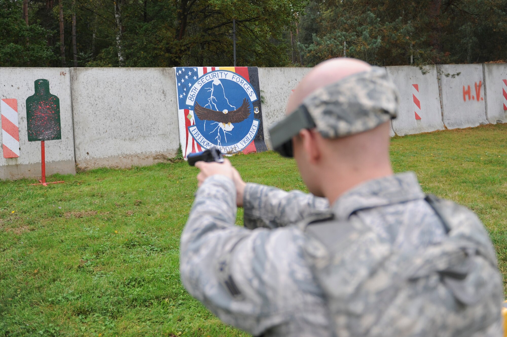 The 86th Security Forces Squadron conducted “Shoot, Move, Communicate” training on Ramstein Air Base, Germany, Oct. 10, 2014. The training is applicable to any high-risk situation, to include but not limited to hostage scenarios and fire fights. (U.S. Air Force photo/Airman 1st Class Michael Stuart) 