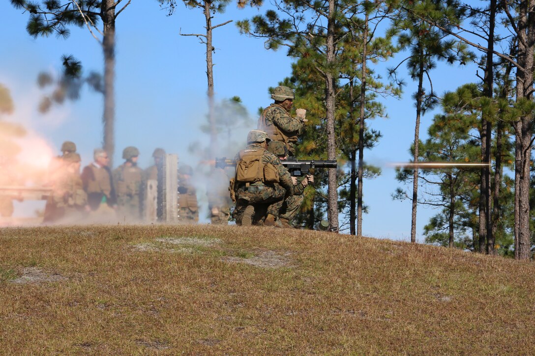 Secretary of Defense Chuck Hagel and leadership of the Ground Combat Element Integrated Task Force observe Marines with the Anti-Armor Section, Weapons Company, GCEITF, fire the MK153 shoulder-launched multipurpose assault weapon (SMAW) rocket launcher during Hagel’s visit to Marine Corps Base Camp Lejeune, North Carolina, Nov. 18, 2014. 
