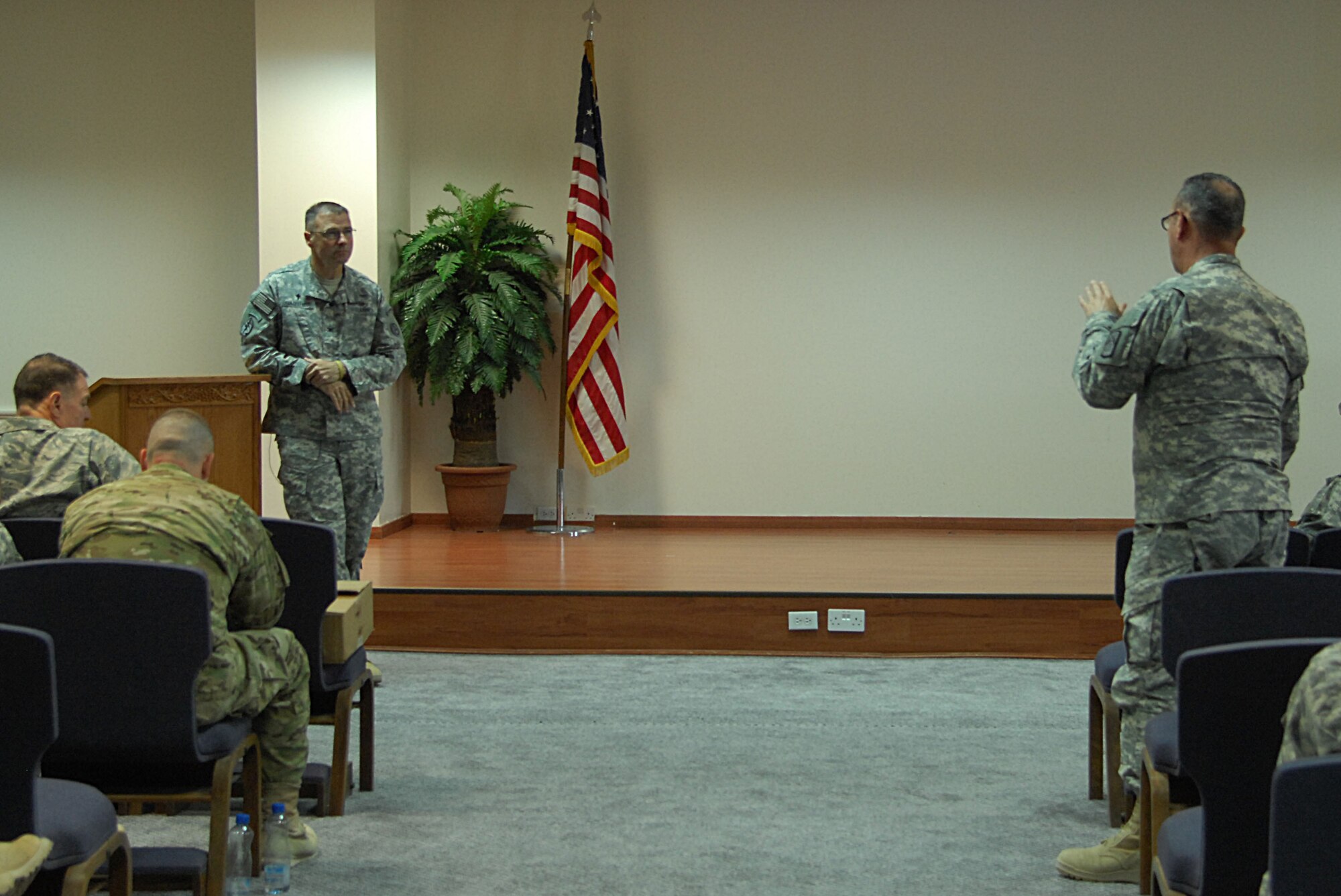 U.S. Army Central Command Chaplain (Col.) Marc Gauthier
listens to a question from a participant at a one-day regional conference hosted by the 386th Air Expeditionary Wing Chapel Nov. 13, 2014.  The conference centered on the themes of caring for the soul and spiritual discipline. (U.S. Air Force photo by 1st Lt. Sarah Ruckriegle /released)
