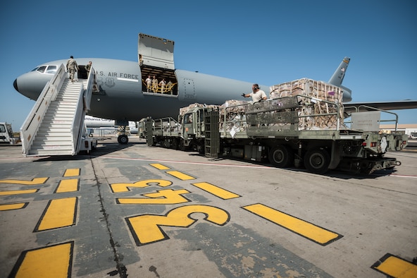 Aerial porters from the Kentucky Air National Guard’s 123rd Contingency Response Group offload humanitarian cargo from a KC-10 Extender Nov. 12, 2014, at the Léopold Sédar Senghor International Airport in Dakar, Senegal. The Kentucky Airmen will stage the cargo in Senegal before transferring it to C-130J Super Hercules for delivery into Monrovia, Liberia, in support of Operation United Assistance, the U.S. Agency for International Development-led, whole-of-government effort to contain the Ebola virus outbreak in West Africa. (U.S. Air National Guard photo/Maj. Dale Greer)