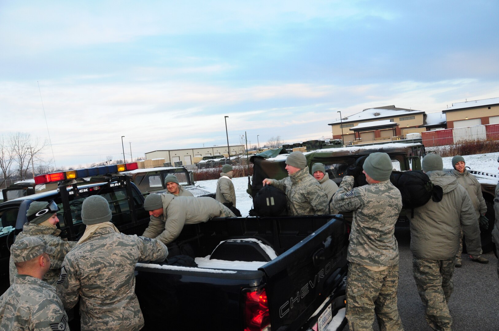 New York Air National Guard’s 107th Security Forces from Niagara Falls, N.Y. deploy to the affected areas in Western New York on Nov. 18, 2014. Airmen grab their gear for the mission.
