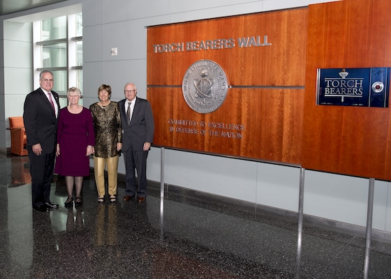 DIA Acting Director David Shedd and his wife, Lisa, stand with newly inducted Torch Bearer Margaret Munson and her husband, Michael, at DIA Headquarters Nov. 13.