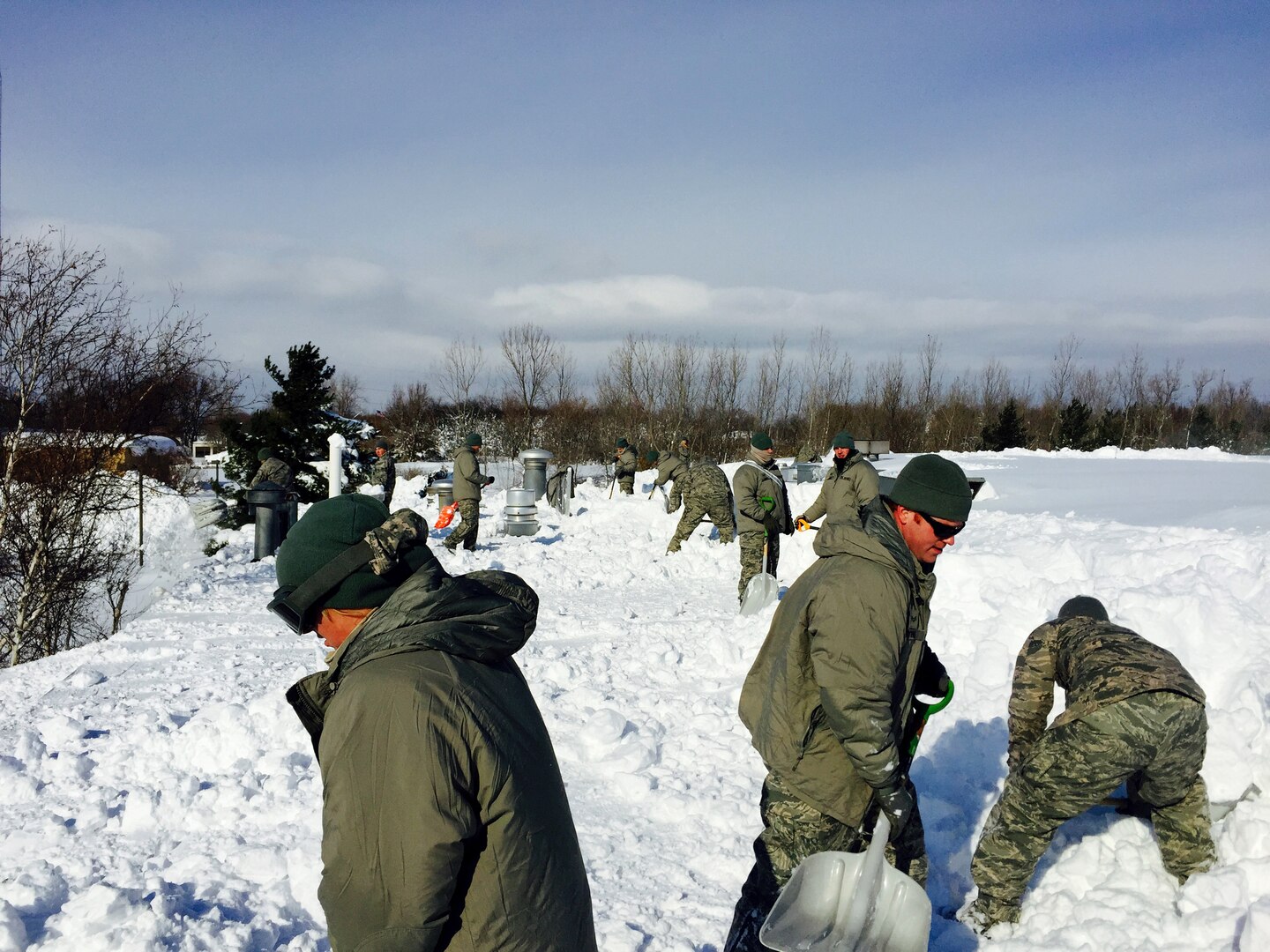 New York Air National Guard members from the 107th Airlift Wing, Niagara Falls, assist in snow removal from the roof of the Eden Heights Assisted Living Facility in West Seneca, New York, Nov. 19, 2014. The facility, like much of Western New York in Erie County, experienced historic levels of lake effect snowfall that paralyzed the City of Buffalo and area roads, businesses and communities.