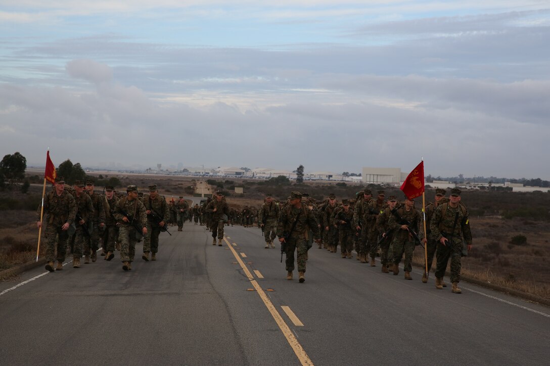 Marines with Marine Wing Communications Squadron (MWCS) 38 conducts a six-mile hike through the east side of Marine Corps Air Station Miramar, Calif., Nov. 14, as part of an annual birthday tradition. Marines also used it as a time to also conduct classes ranging from chemical biological radiological neurological defense to domestic and child abuse awareness training.