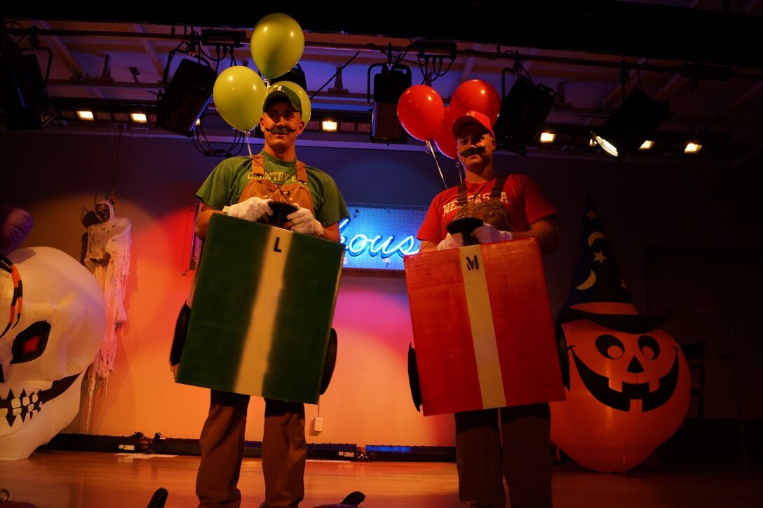 October 31 2014: Sergeant John Catsinas (left) and Sergeant Landon Wilhite (right) pose for a picture as Mario and Luigi during the CATC Camp Fuji Halloween costume competition.