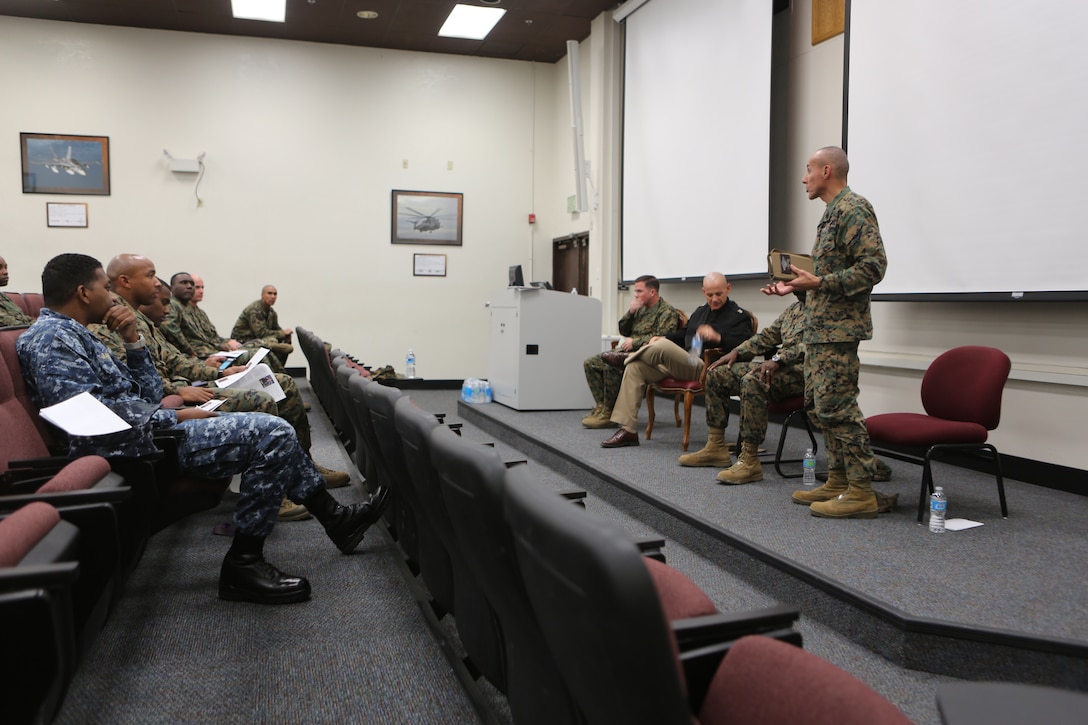 Command Master Chief Frank Dominguez, the I Marine Expeditionary Force (Forward) command master chief, addresses members of the National Naval Officer Association during a professional military education class aboard Marine Corps Air Station Miramar, Calif., Nov. 18.  The class was held to highlight the role of a senior enlisted advisor and receive their point of view on various situations.