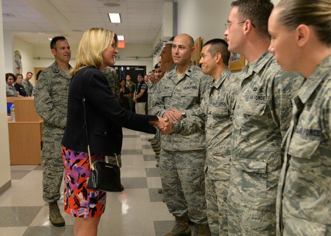 Secretary of the Air Force Deborah Lee James talks with Staff Sgt. Michael Speakman, 36th Medical Operations Squadron, who was recognized as one of Team Andersen’s outstanding Airmen Nov. 19, 2014, at Andersen Air Force Base, Guam. James visited Andersen as part of a visit to get a first-hand look at Airmen in action across the Pacific with stops in Alaska, Hawaii, Japan and the Republic of Korea. (U.S. Air Force photo by Senior Airman Katrina M. Brisbin/Released)