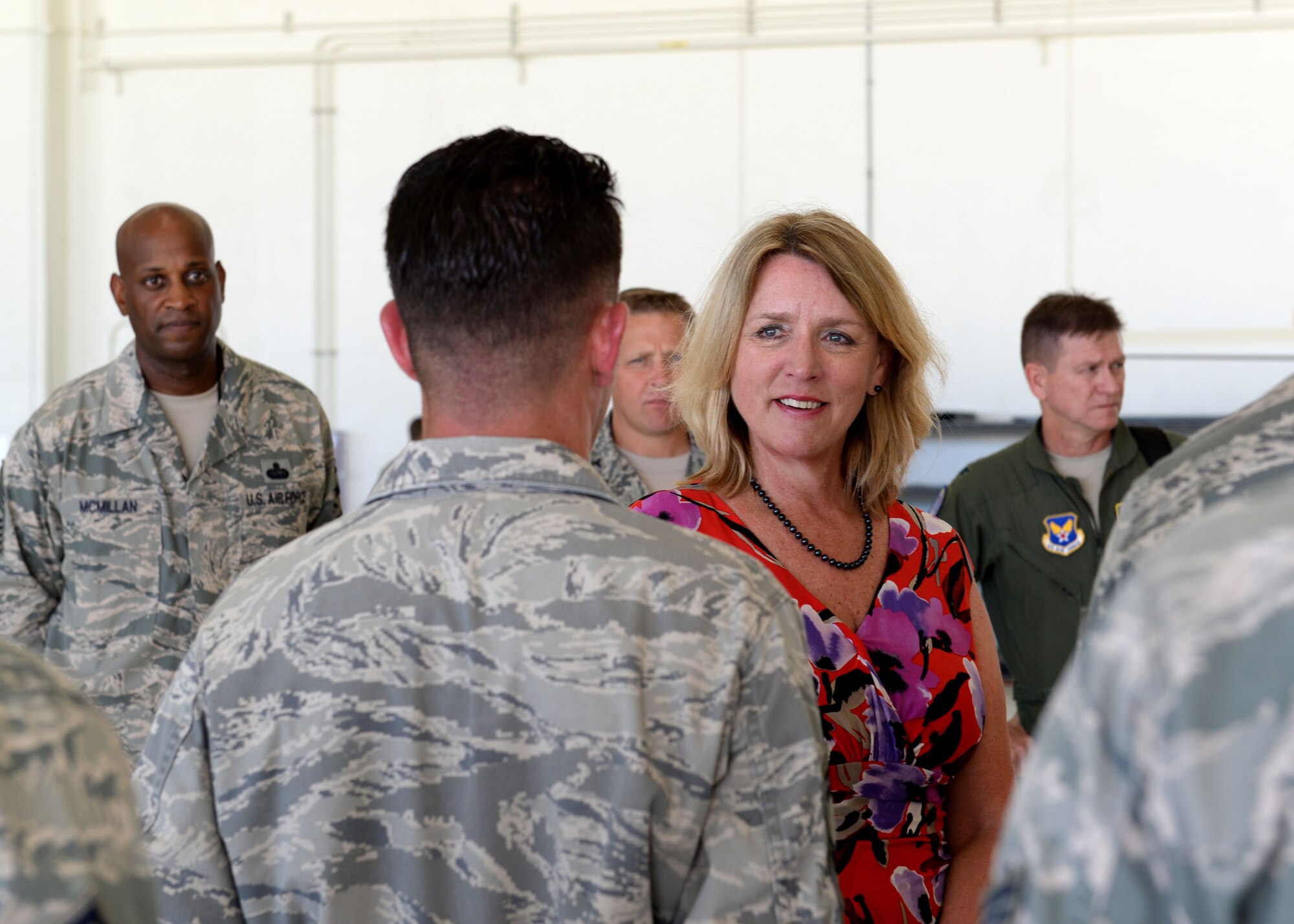 Secretary of the Air Force Deborah Lee James learns about RQ-4A Global Hawk mission capabilities from talking with 69th Reconnaissance Squadron, Detachment 2 Airmen Nov. 19, 2014, at Andersen Air Force Base, Guam. The Secretary met and discussed Air Force policies and goals with Airmen and local community leaders during her two-day visit to Andersen and received a first-hand look at the base's critical role in the strategic Pacific rebalance.  (U.S. Air Force photo by Airman 1st Class Amanda Morris/Released)