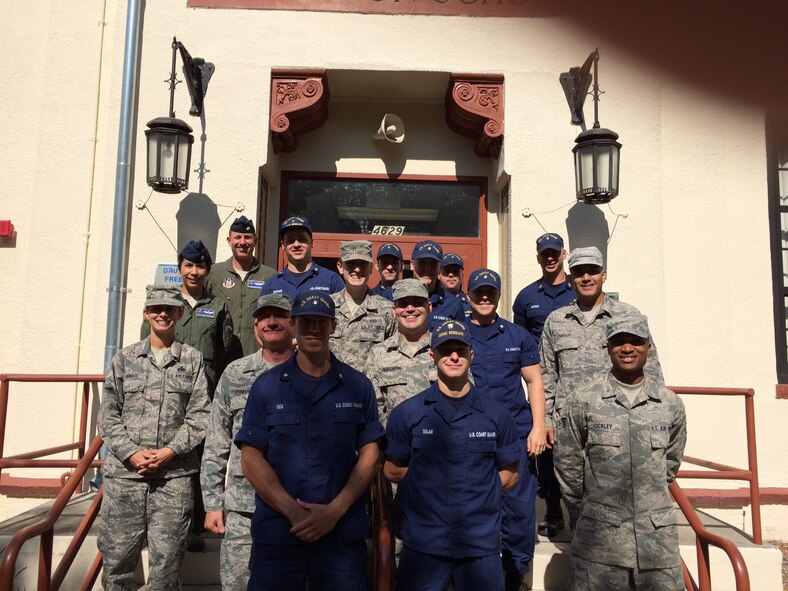 Members of the 927 Air Refueling Wing and Coast Guard St. Petersburg Sector take a photo op at St. Pete High School November 19. Over 20 members participated in the Great American Teach-In visiting over 11 schools, 110 classes and 2200 students throughout the day. (U.S. Air Force Photo/TSgt Peter Dean)
