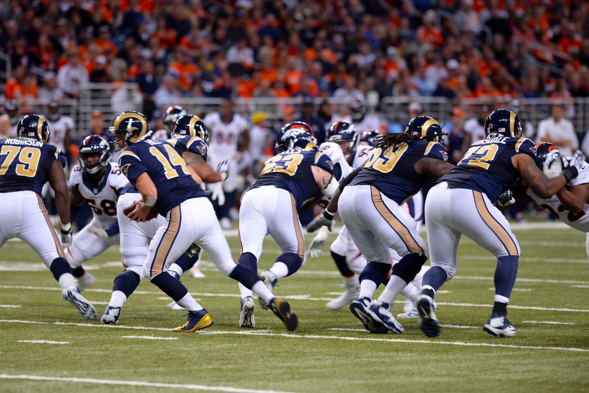The St. Louis Rams clash with the Denver Broncos at the Edward Jones Dome, St. Louis, Nov. 16, 2014. The Rams won 7-22. The day included a Military Appreciation Day event honoring wounded warriors and featuring honor guards from every branch of the Armed Forces presenting the colors. (U.S. Air Force photo by Airman 1st Class Erica Crossen)